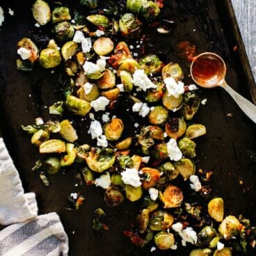 Roasted Brussels Sprouts with Goat Cheese & Harissa | A Couple Cooks