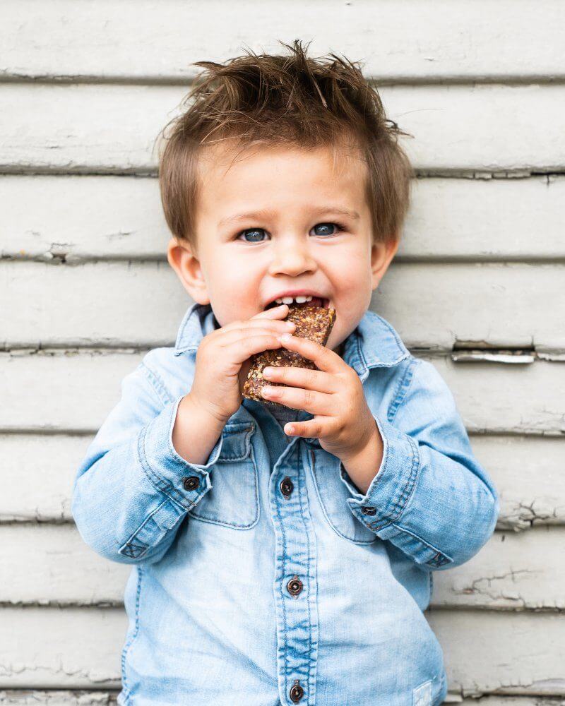 Kid eating energy bar