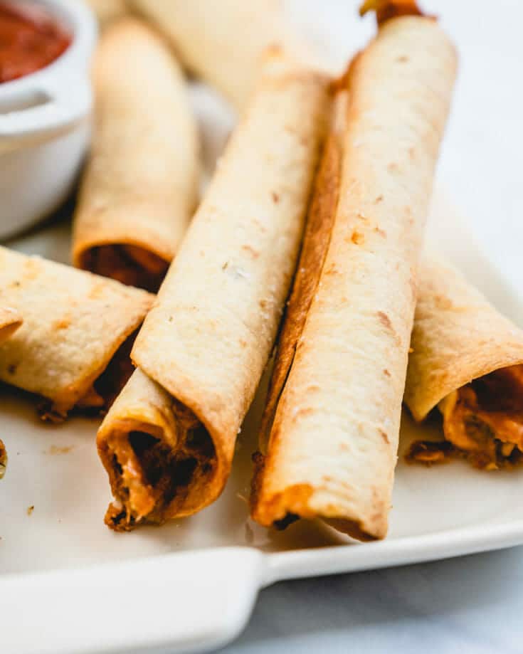 Easy Baked Flautas (Taquitos!) A Couple Cooks