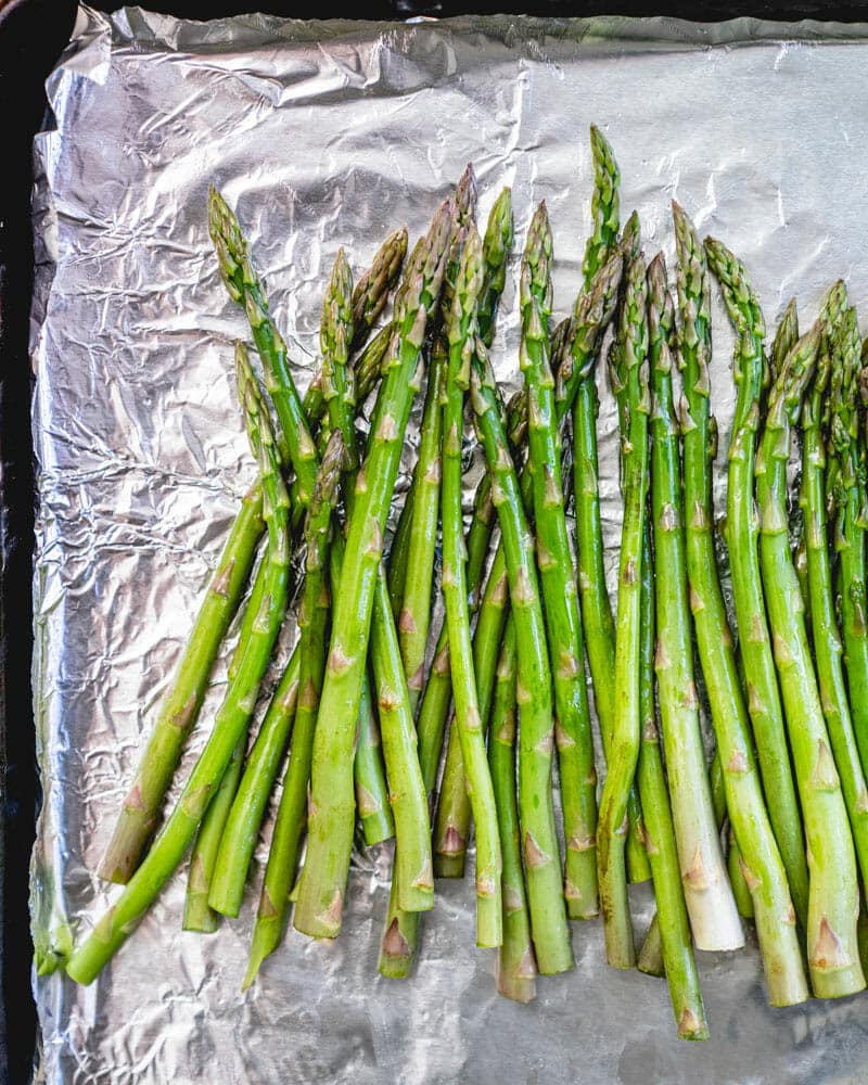 Asparagus on baking sheet