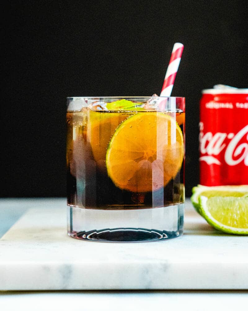 https://www.acouplecooks.com/wp-content/uploads/2020/11/Rum-and-Coke-006.jpg