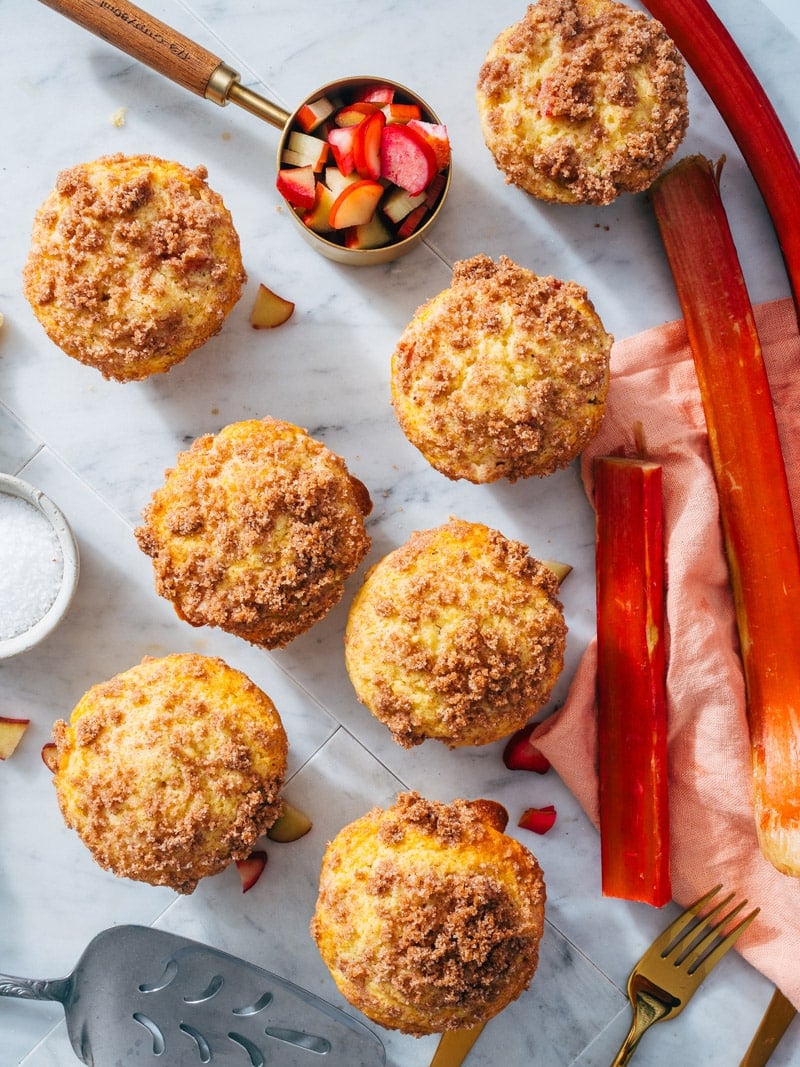 Rhubarb muffins recipe with rhubarb stalks and chopped rhubarb.