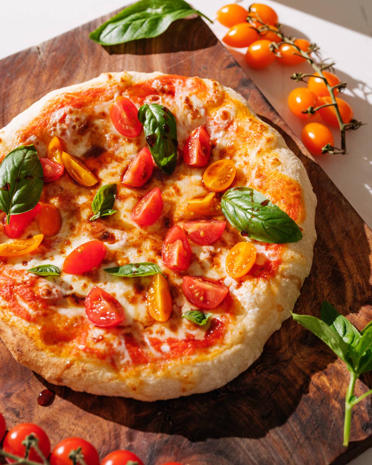 Caprese Pizza on cutting board