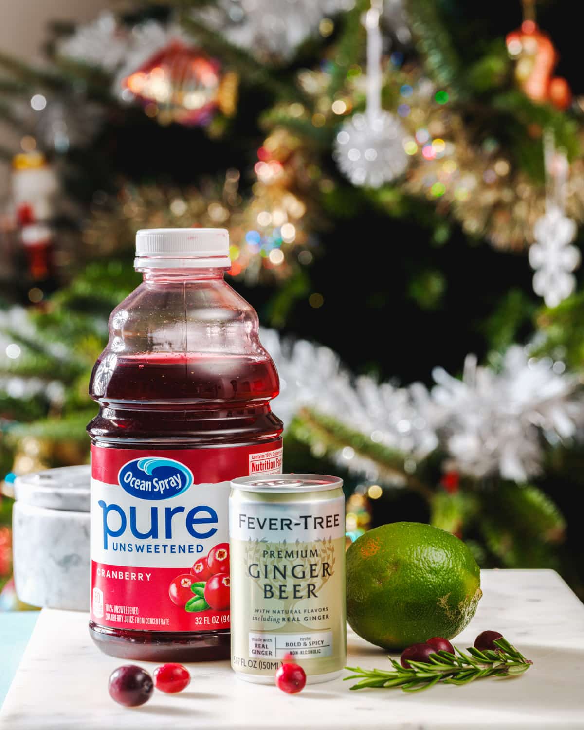 Christmas mocktail ingredients: Cranberry juice, lime, ginger beer