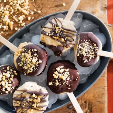 Greek Yogurt Popsicles with chocolate Magic shell over ice